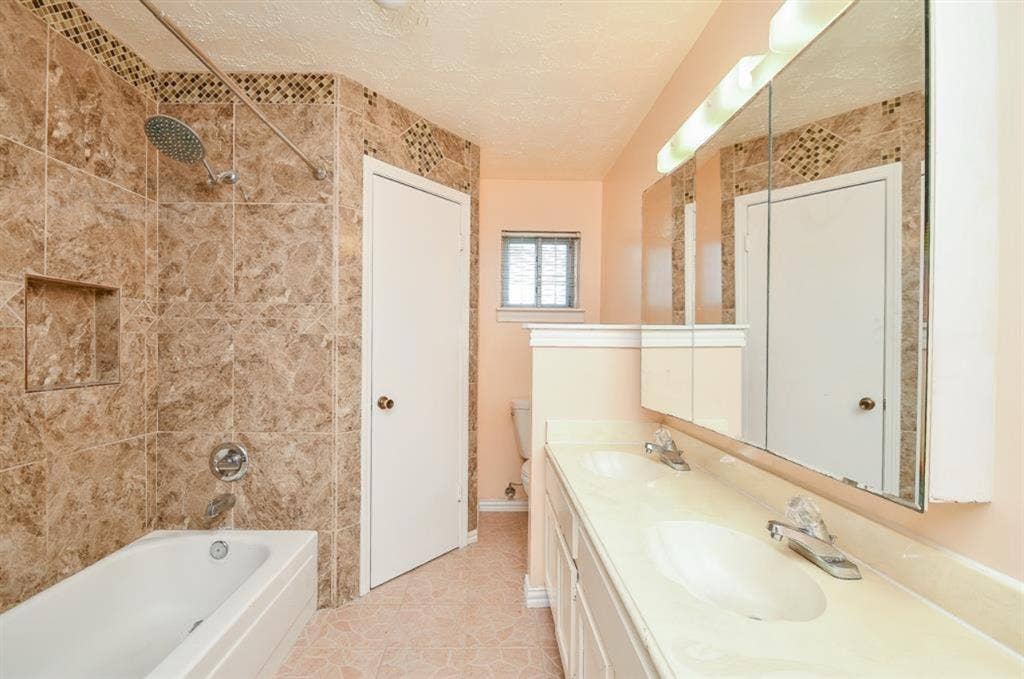 Master bedroom w/ private bathroom