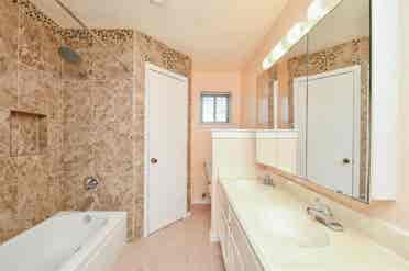 Master bedroom w/ private bathroom