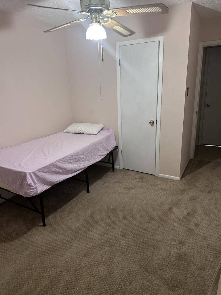 Bedroom with shared bathroom