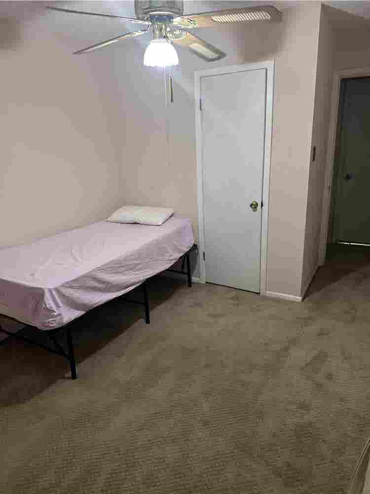 Bedroom with shared bathroom