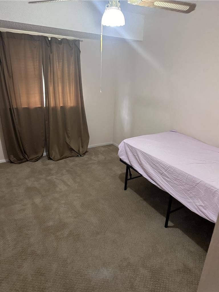 Bedroom with shared bathroom