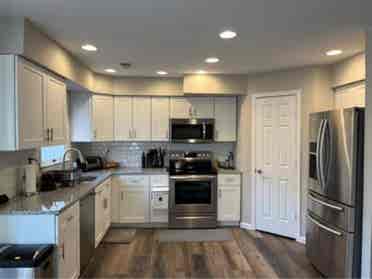Master bedroom w/ private bathroom