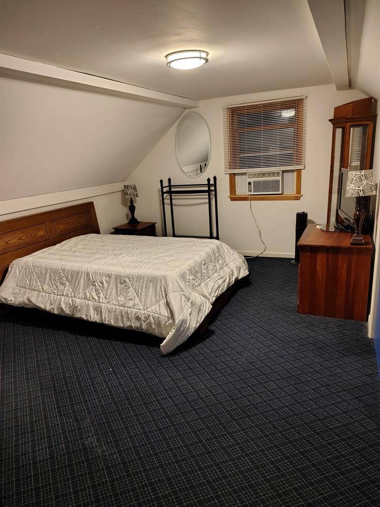 Large room in a home with pool