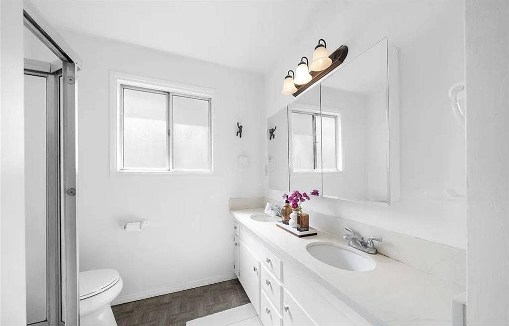 Bedroom open in cozy, artsy home