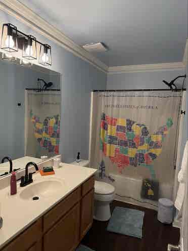Furnished room with bathroom