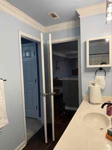 Furnished room with bathroom