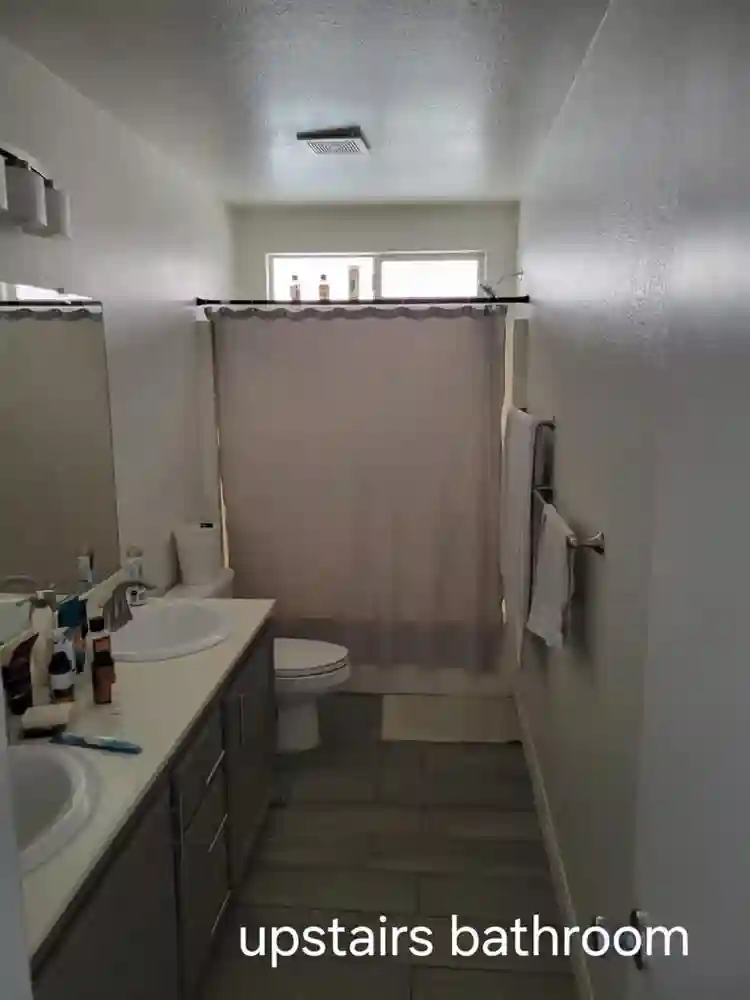 A room with shared bathroom