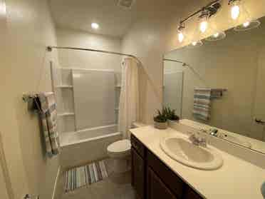 Furnished bedroom en suite bathroom