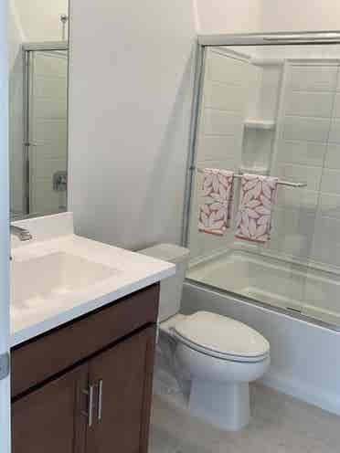 Furnished bedroom with private bath