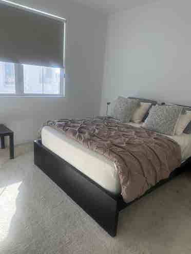 Furnished bedroom with private bath