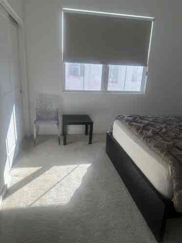 Furnished bedroom with private bath