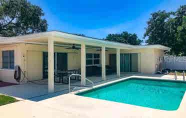 Fully furnished room with a pool!