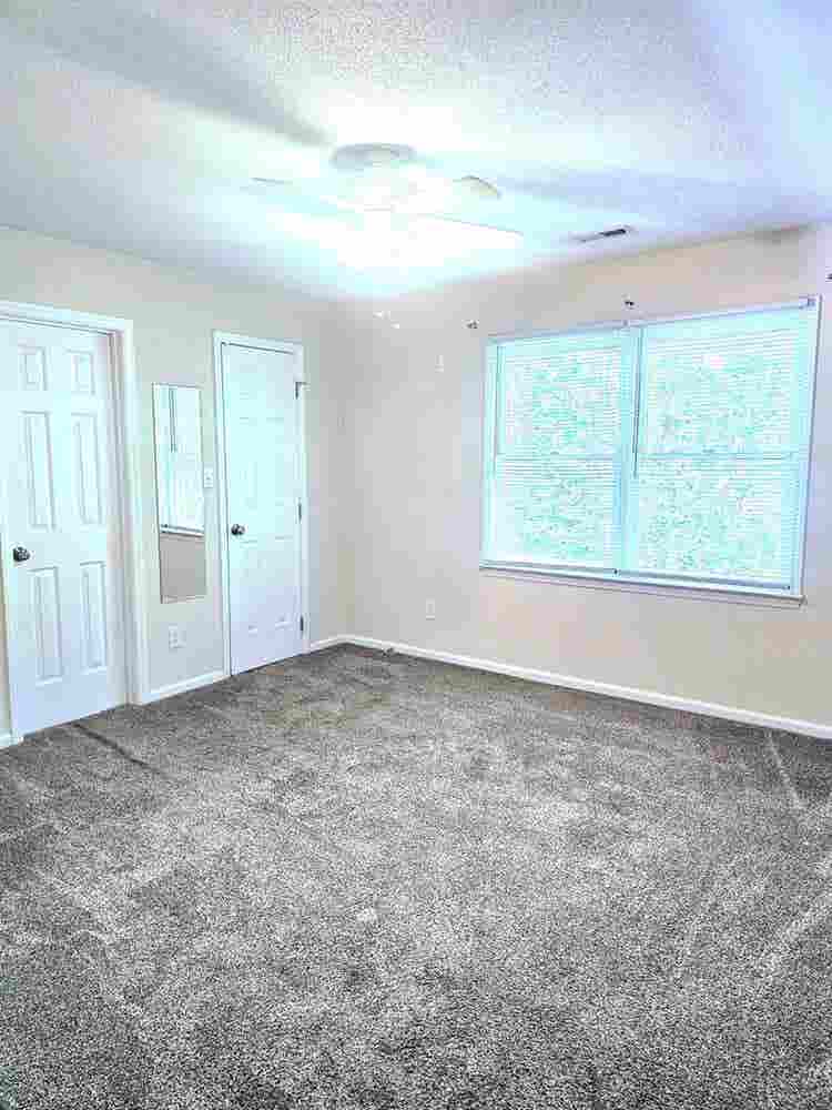 Private bedroom with attached bath