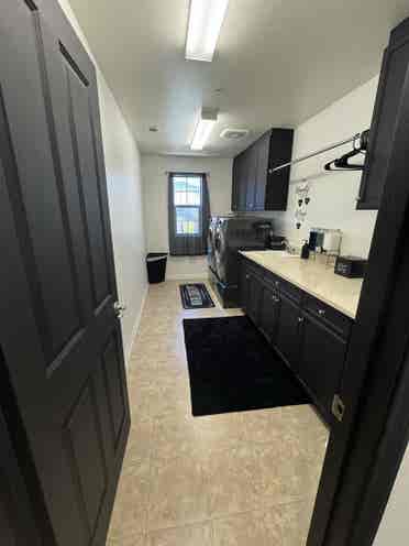Bedroom and full bathroom with tub