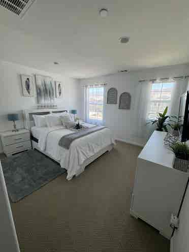 Bedroom and full bathroom with tub