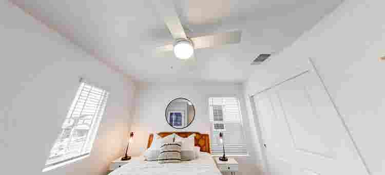 A room, bathroom and a parking spot