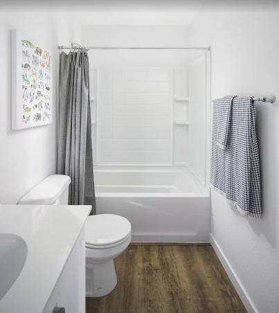 A room, bathroom and a parking spot