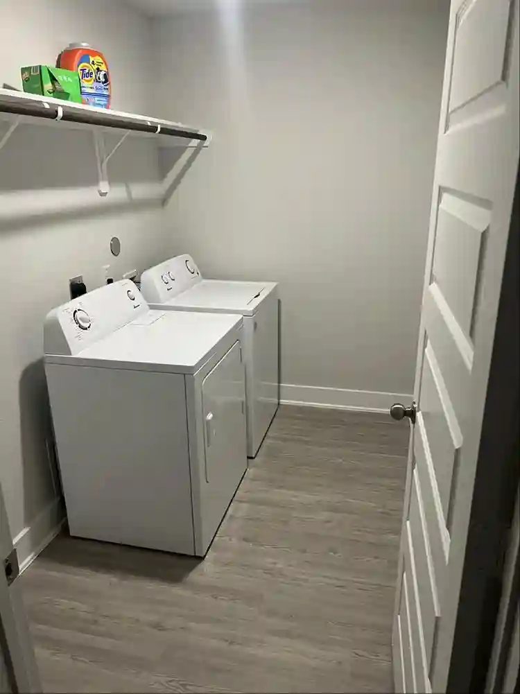 Fully furnished room with amenities