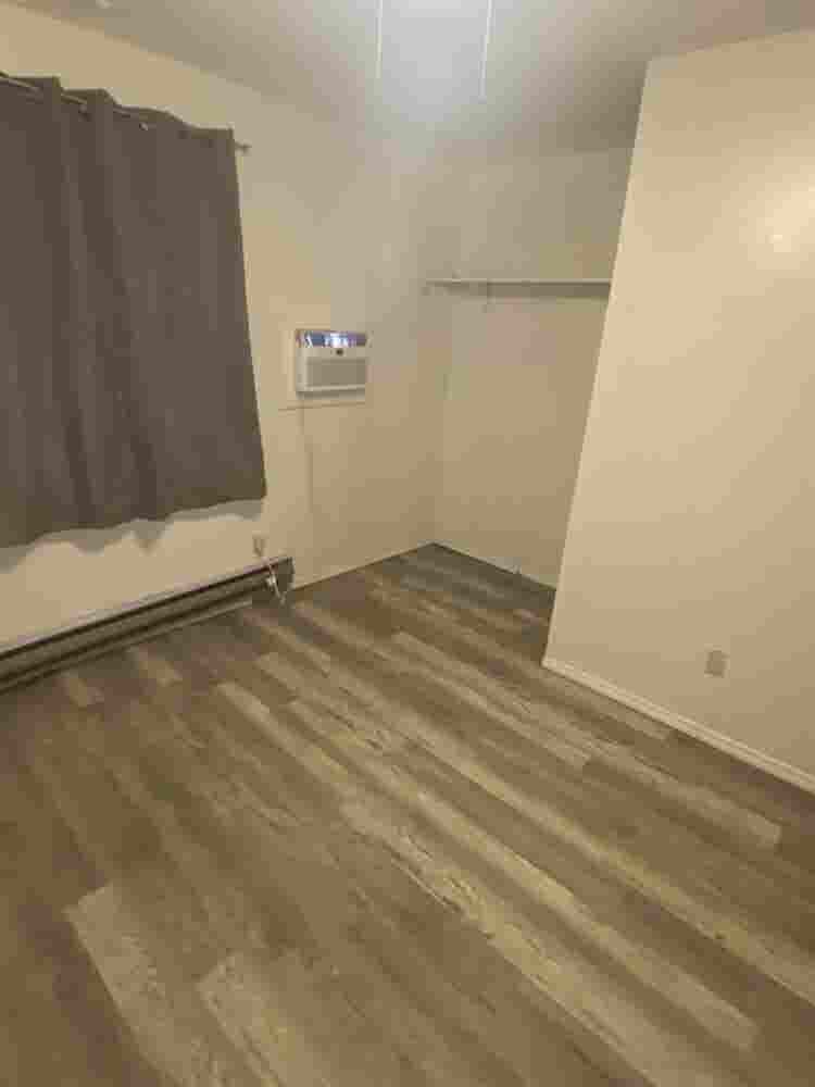 Bedroom with shared bathroom