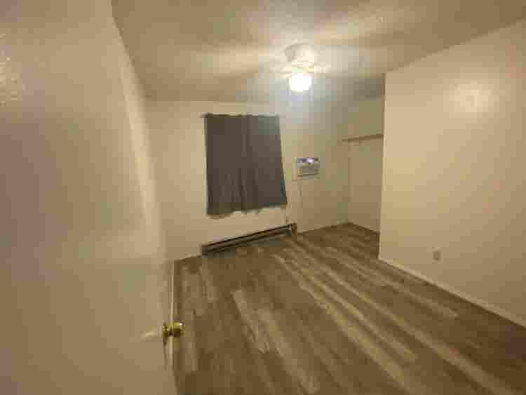 Bedroom with shared bathroom