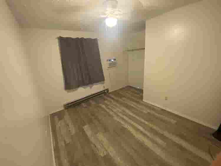 Bedroom with shared bathroom