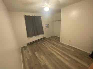 Bedroom with shared bathroom