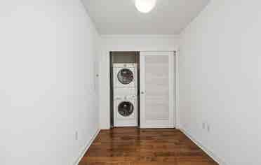 Bright 1BR + Den with City Views