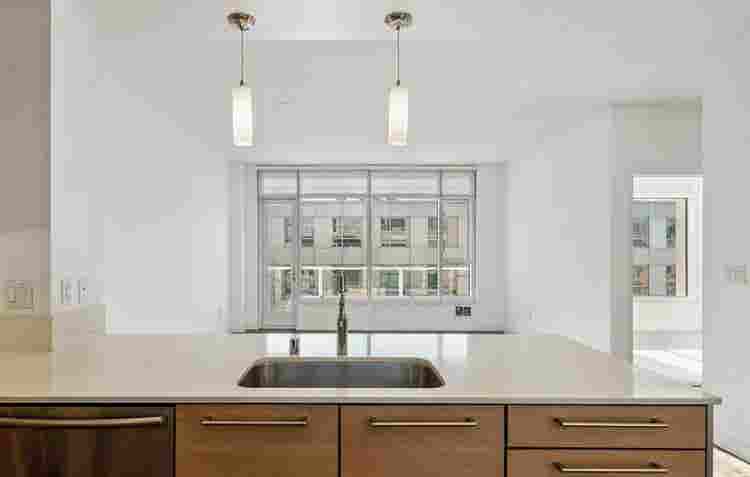 Bright 1BR + Den with City Views