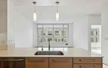 Bright 1BR + Den with City Views
