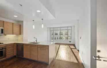 Bright 1BR + Den with City Views