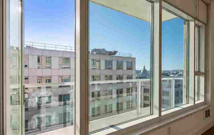 Bright 1BR + Den with City Views