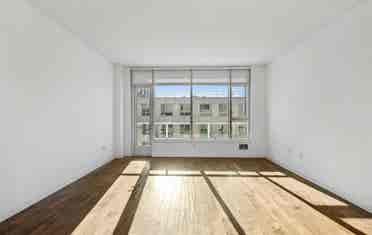 Bright 1BR + Den with City Views