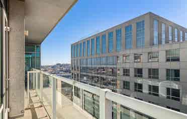 Bright 1BR + Den with City Views