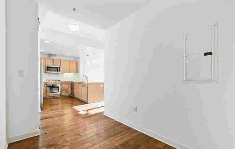 Bright 1BR + Den with City Views