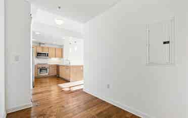 Bright 1BR + Den with City Views
