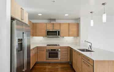 Bright 1BR + Den with City Views