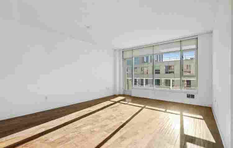 Bright 1BR + Den with City Views