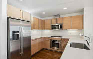 Bright 1BR + Den with City Views