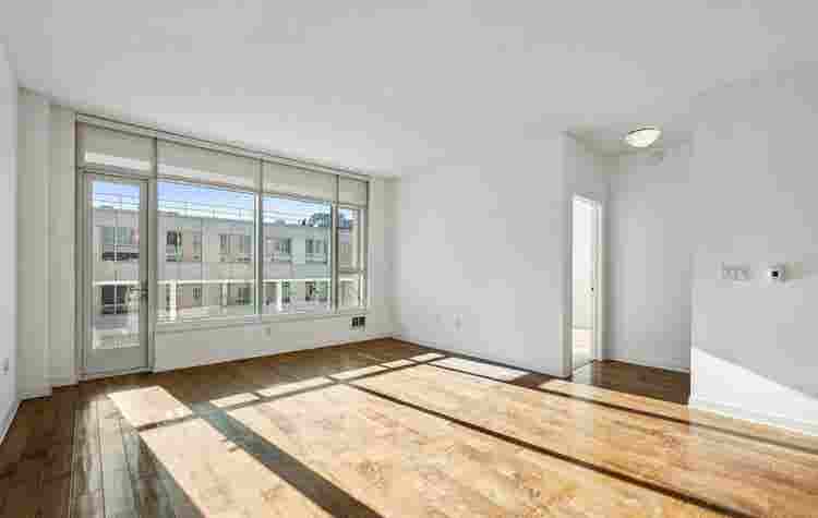 Bright 1BR + Den with City Views