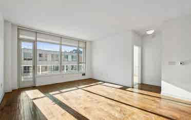 Bright 1BR + Den with City Views
