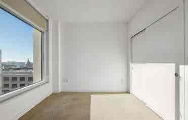 Bright 1BR + Den with City Views