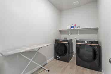 A furnished room with shared spaces
