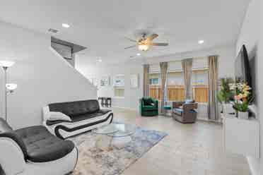 A furnished room with shared spaces