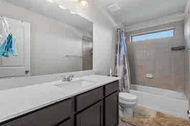 A furnished room with shared spaces