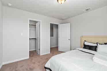 A furnished room with shared spaces