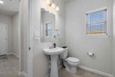 A furnished room with shared spaces