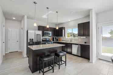 A furnished room with shared spaces