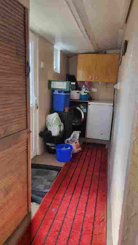 Furnished Room with TV, Table & Bed