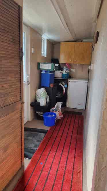 Furnished Room with TV, Table & Bed