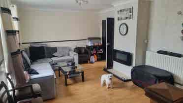 Furnished Room with TV, Table & Bed